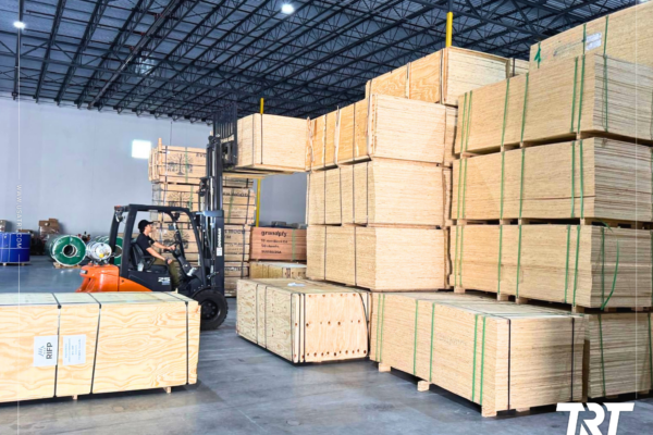 Freight consolidation — forklift moving wooden crates in a Savannah warehouse