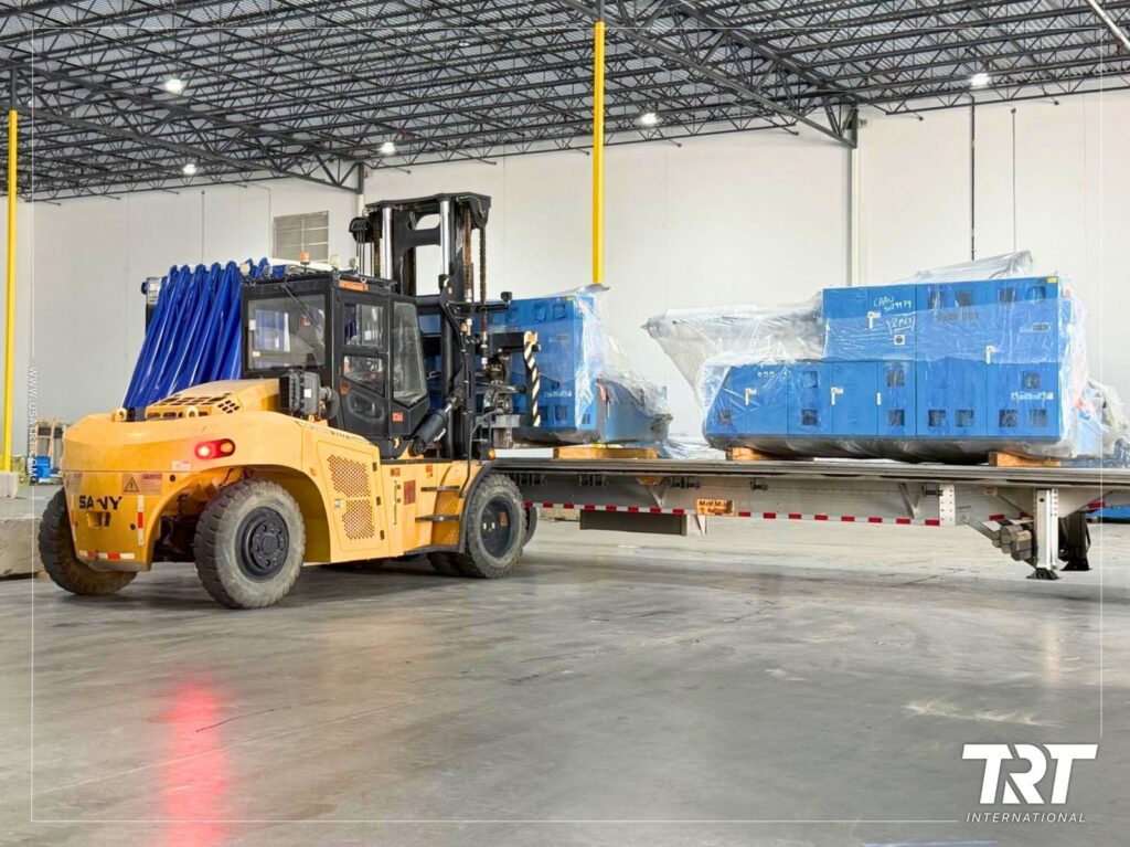 Cross-dock services — forklift loading palletized cargo onto a trailer